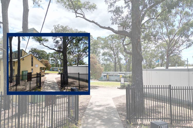 Photo shows the school entry and of the old school building