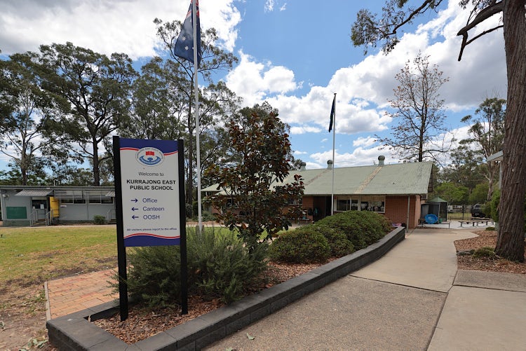 Photo of the school classroom with sign